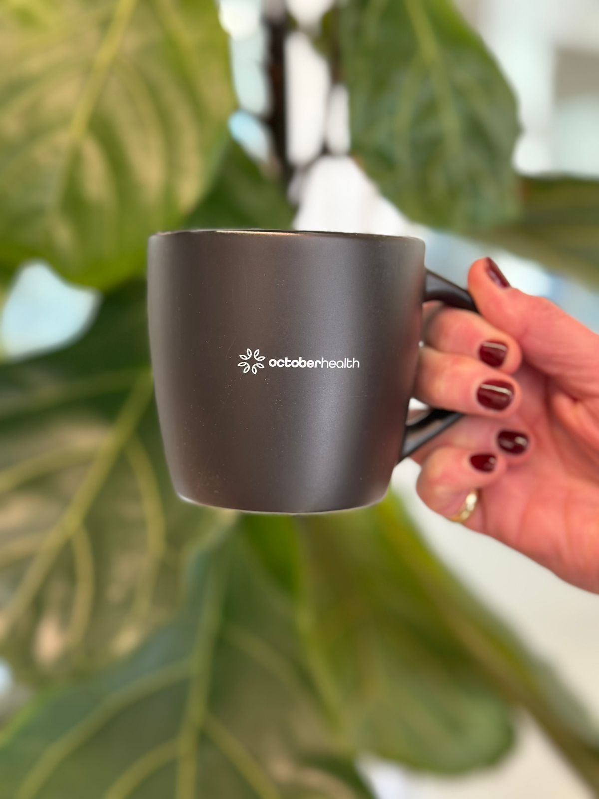October Health branded coffee mug